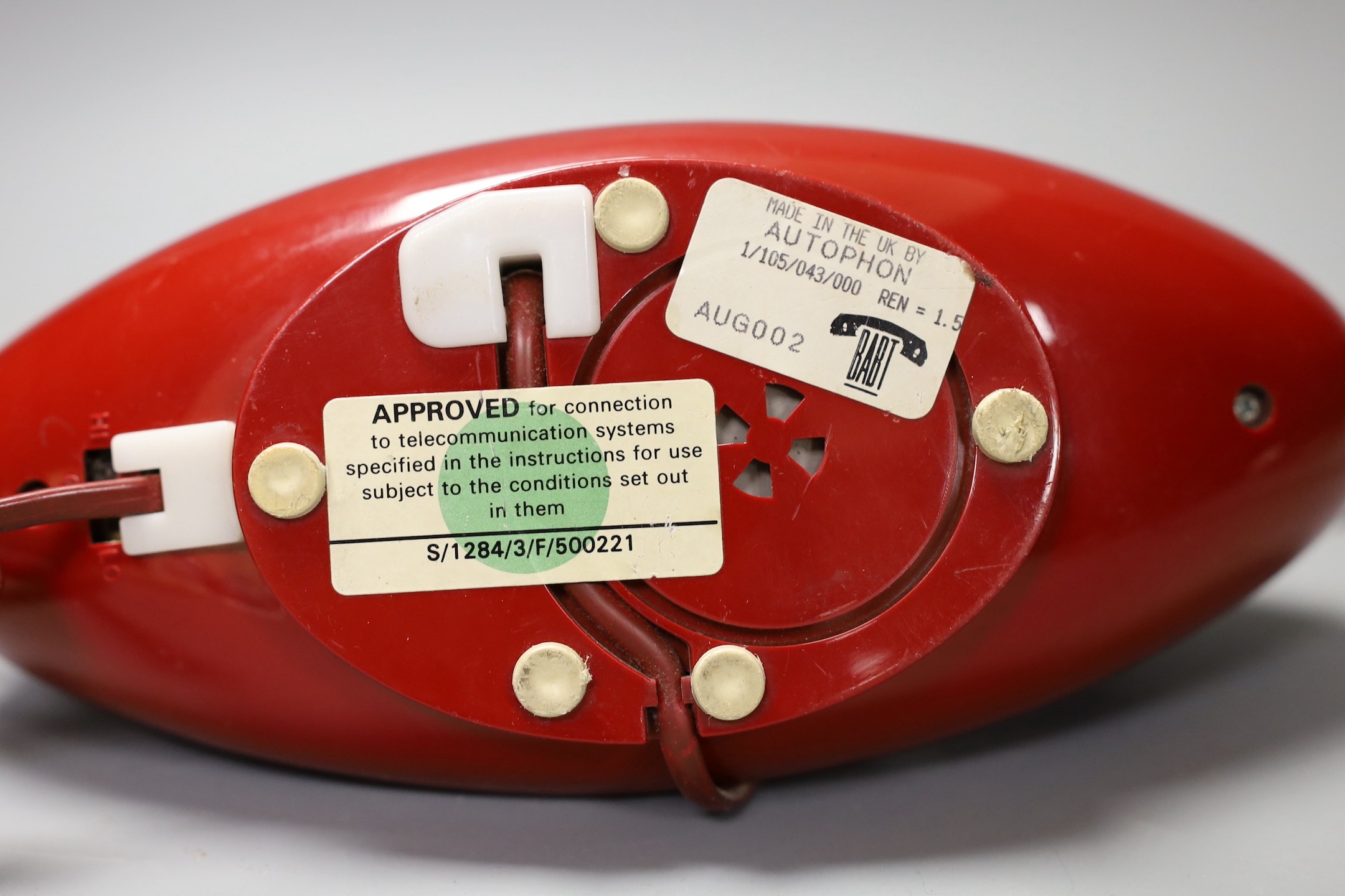 Two Autophon telephone handsets, AUG002 and AUG005, 24 cms wide